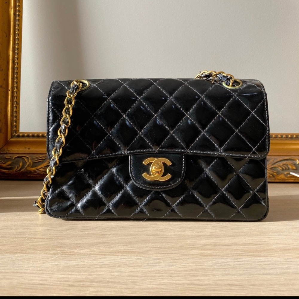 Authentic Chanel purse with authenticity card, and just bag. Purchased in 1996.